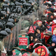 Riot police use pepper spray as South Korean farmers try to break through a police barrier.